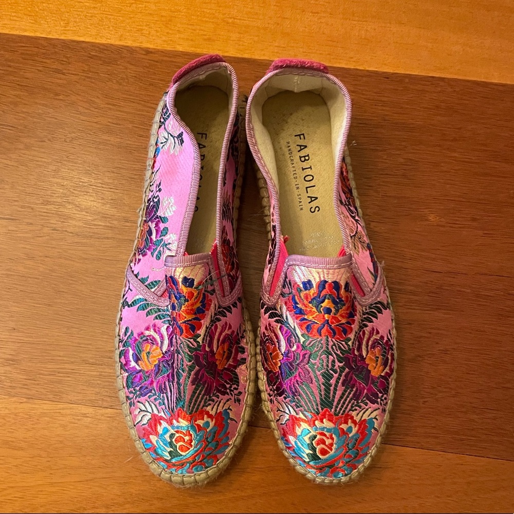 Pink embroidered slip ons